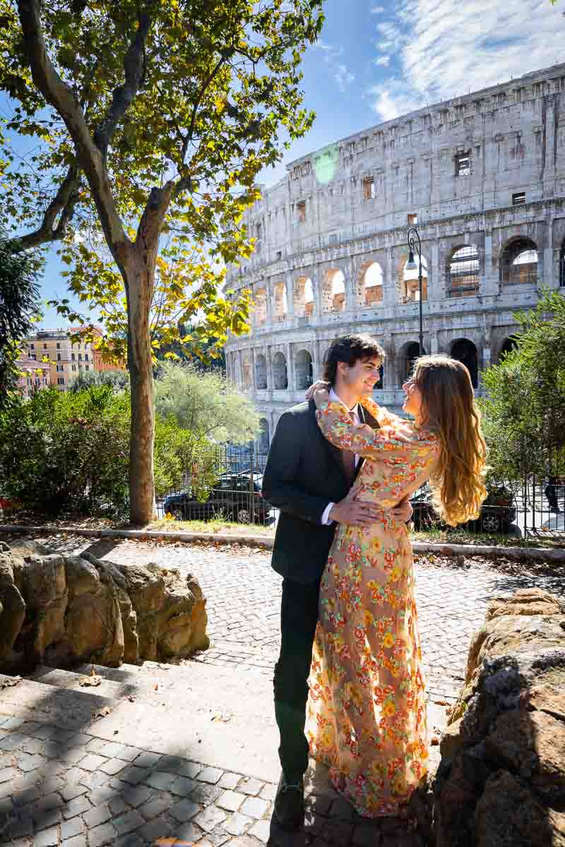 Unique and creative couple photoshoot by the Andrea Matone photographer studio taken at the Roman Colosseum. Finding a new angle view 