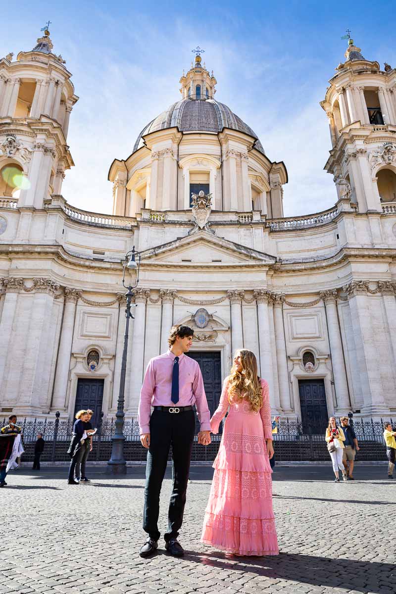 Piazza Navona photo session with a couple wearing pink