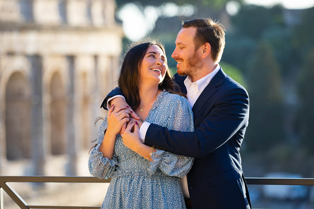 Portrait picture of a couple in front of the Coliseum