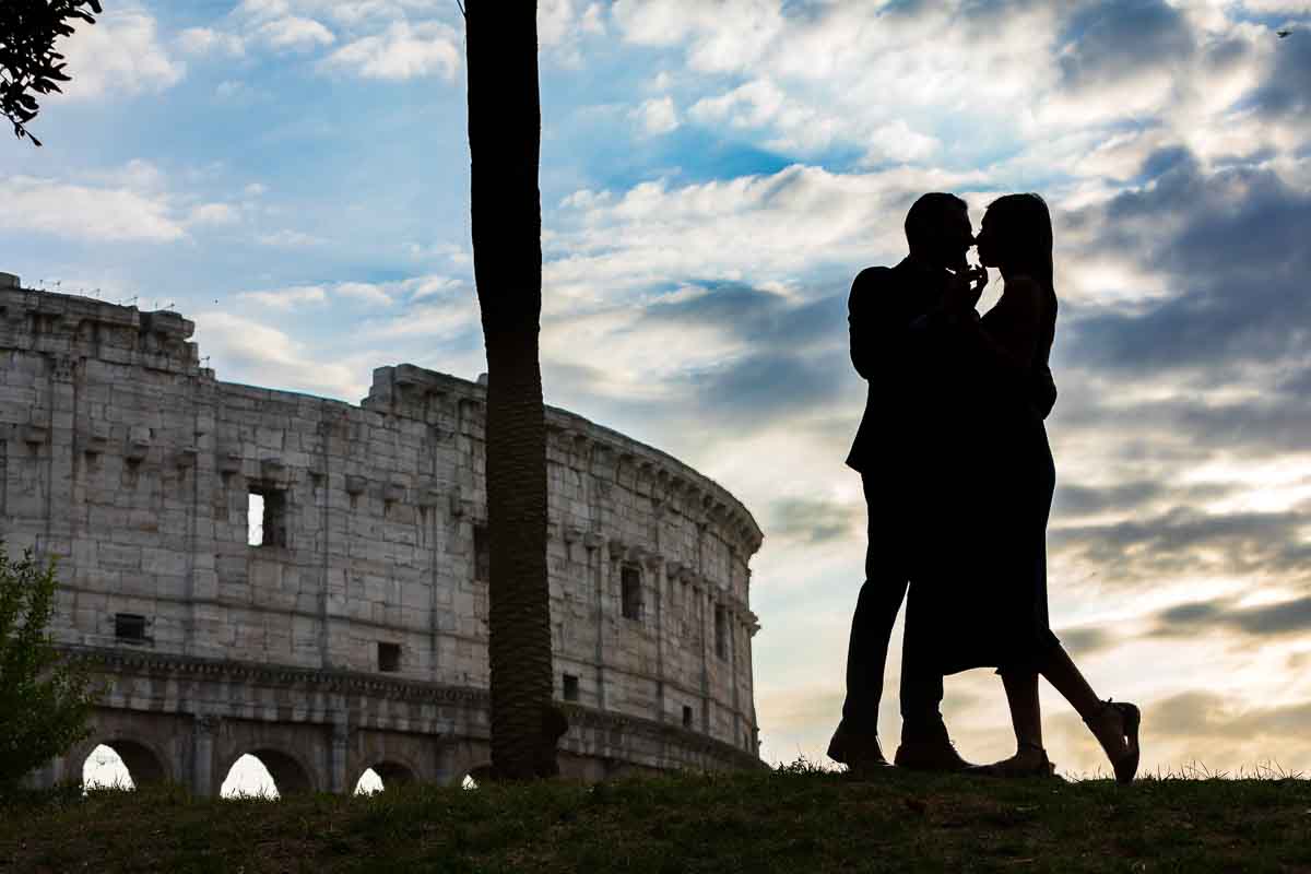 Romantic silhouette picture of a couple during a photo session in eternal city of Rome