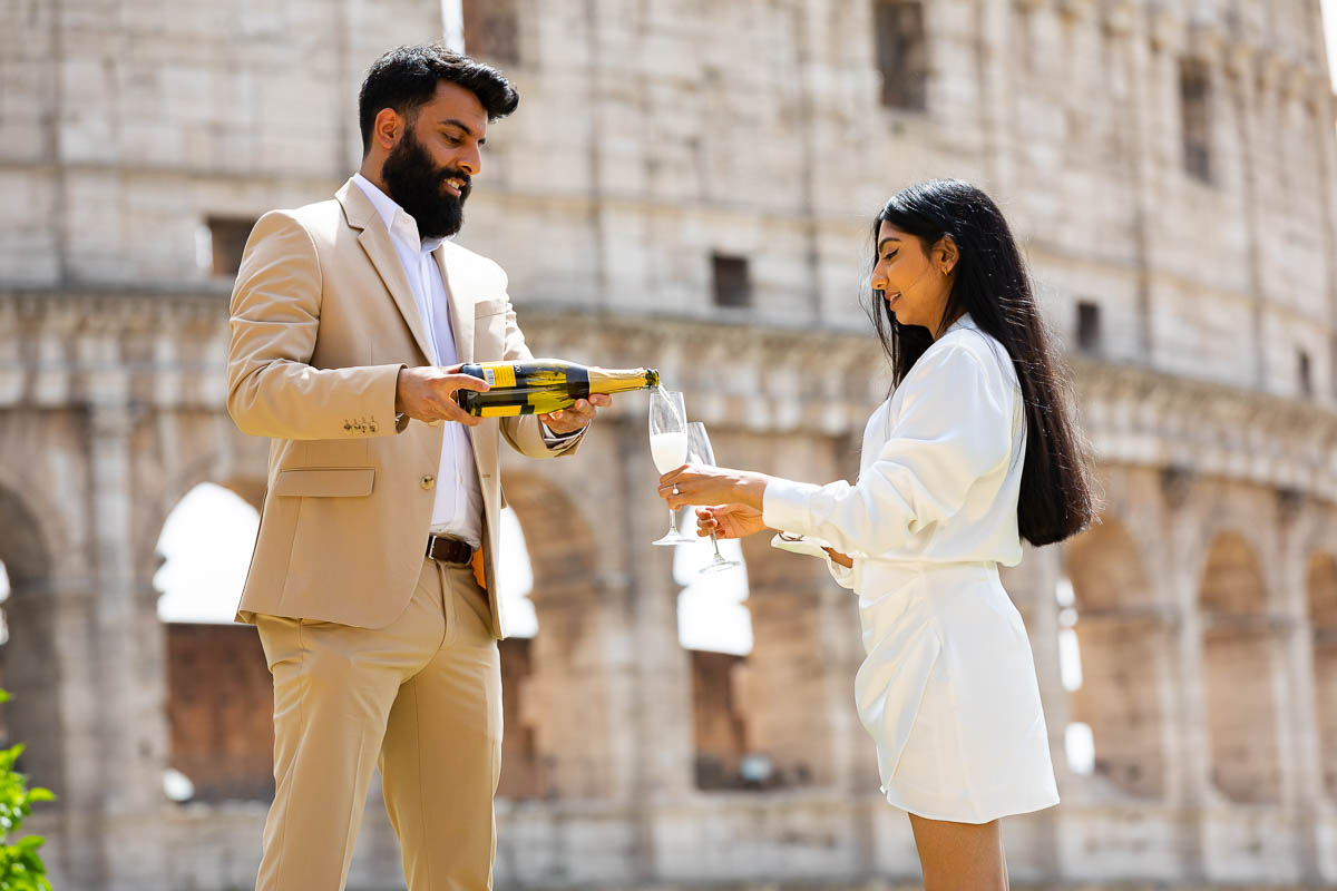 Celebrating with an Italian Prosecco sparkling wine poured into the couple's glass flutes