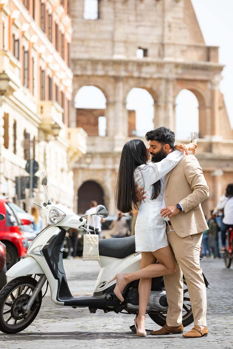 Taking fun and creative engagement pictures in Rome using a Piaggio Liberty scooter in Rome Italy