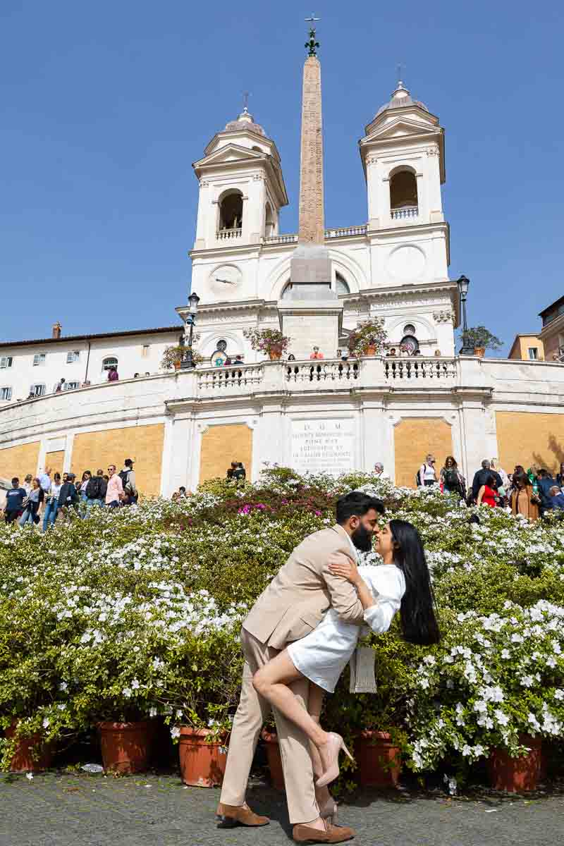 Couple photography session at the Spanish steps covered in beautiful spring flowers