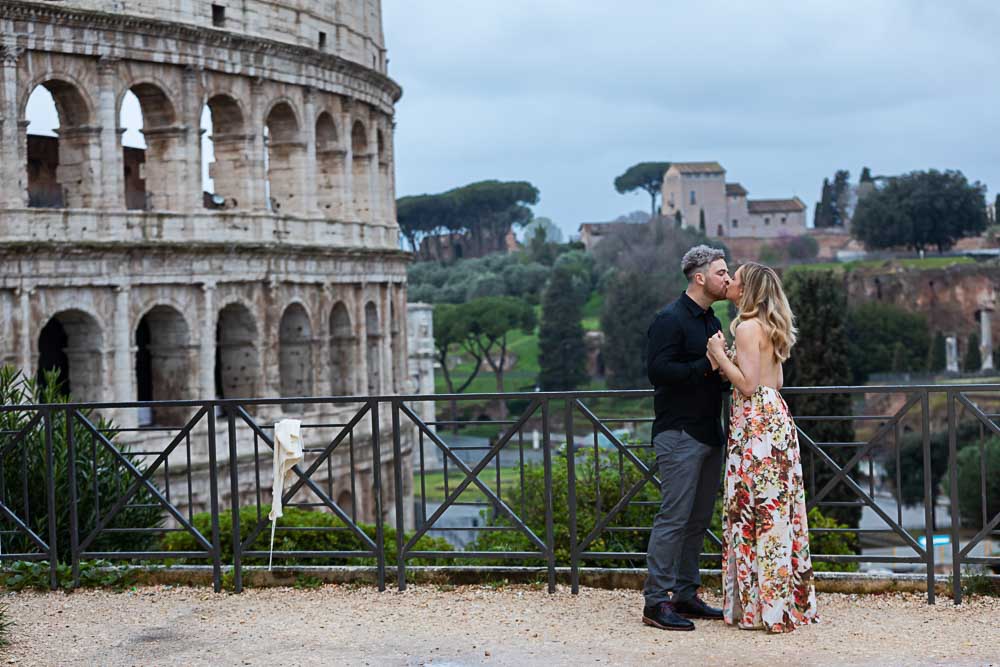 Taking engagement pictures at the Roman Coliseum in the early morning