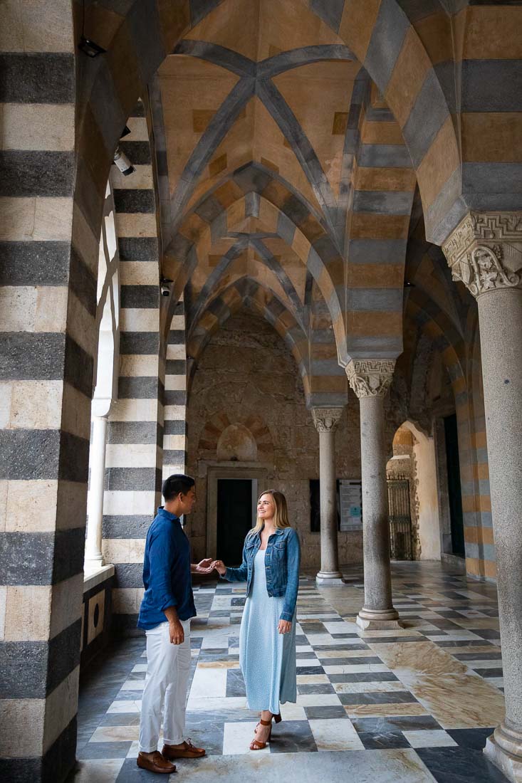 Taking pictures together under the beautiful church porticos