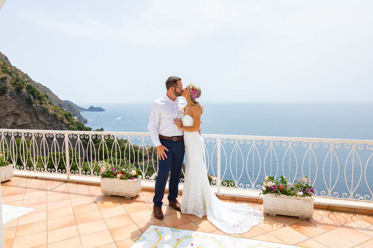 Bride and Groom kissing just married