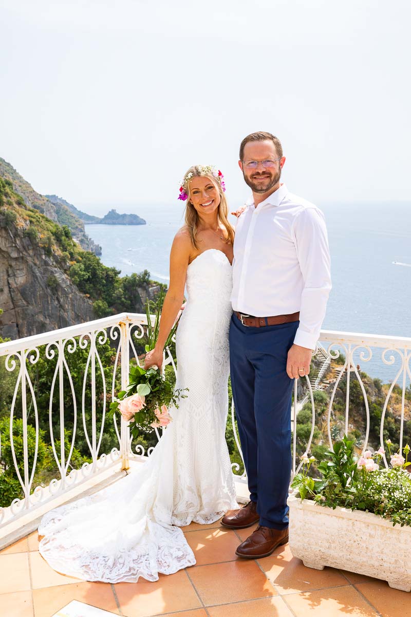 Newlywed portrait on a terrace over the Amalfi coast in the town of Praiano Wedding Photography 