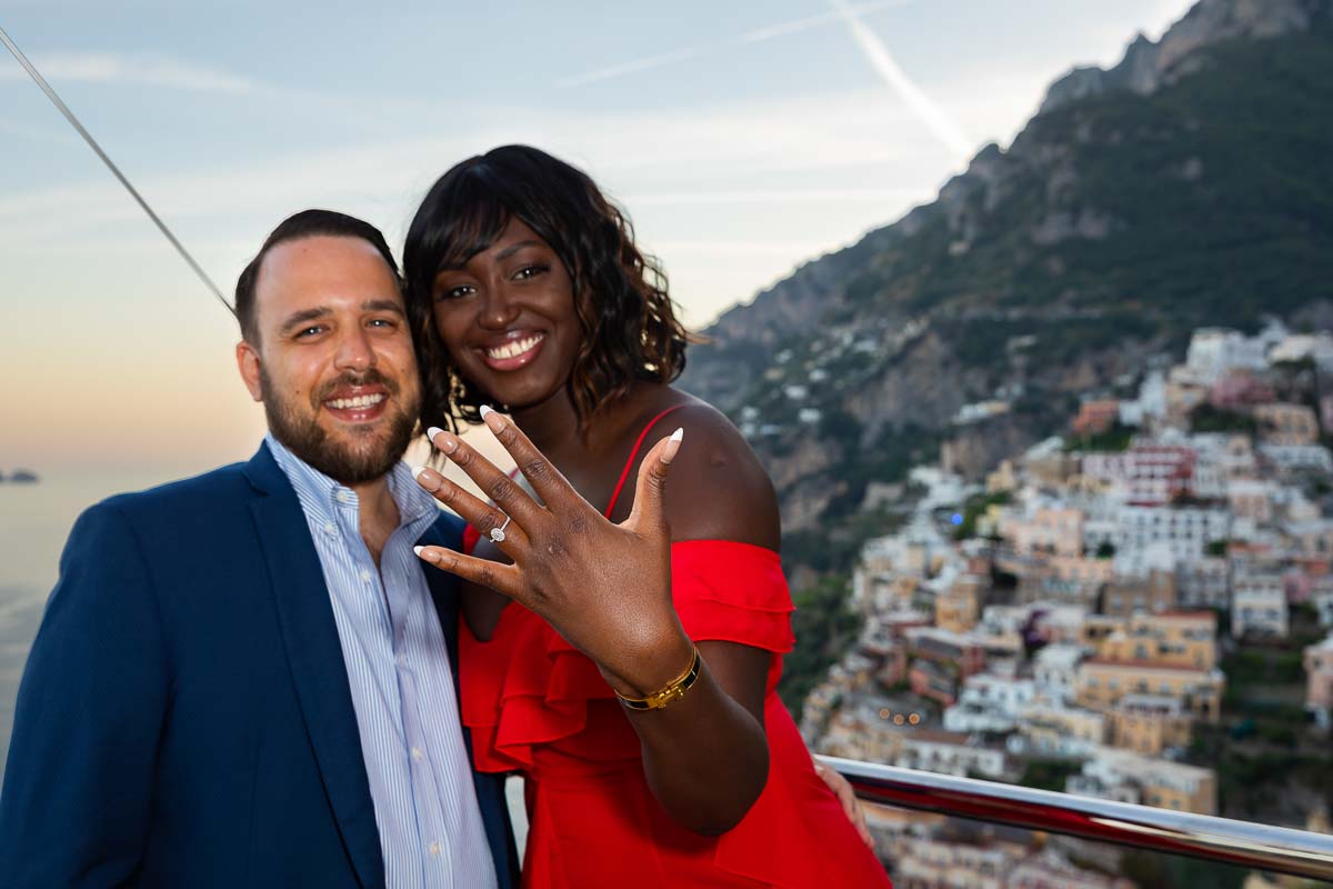 Showing off the engagement ring on the finger