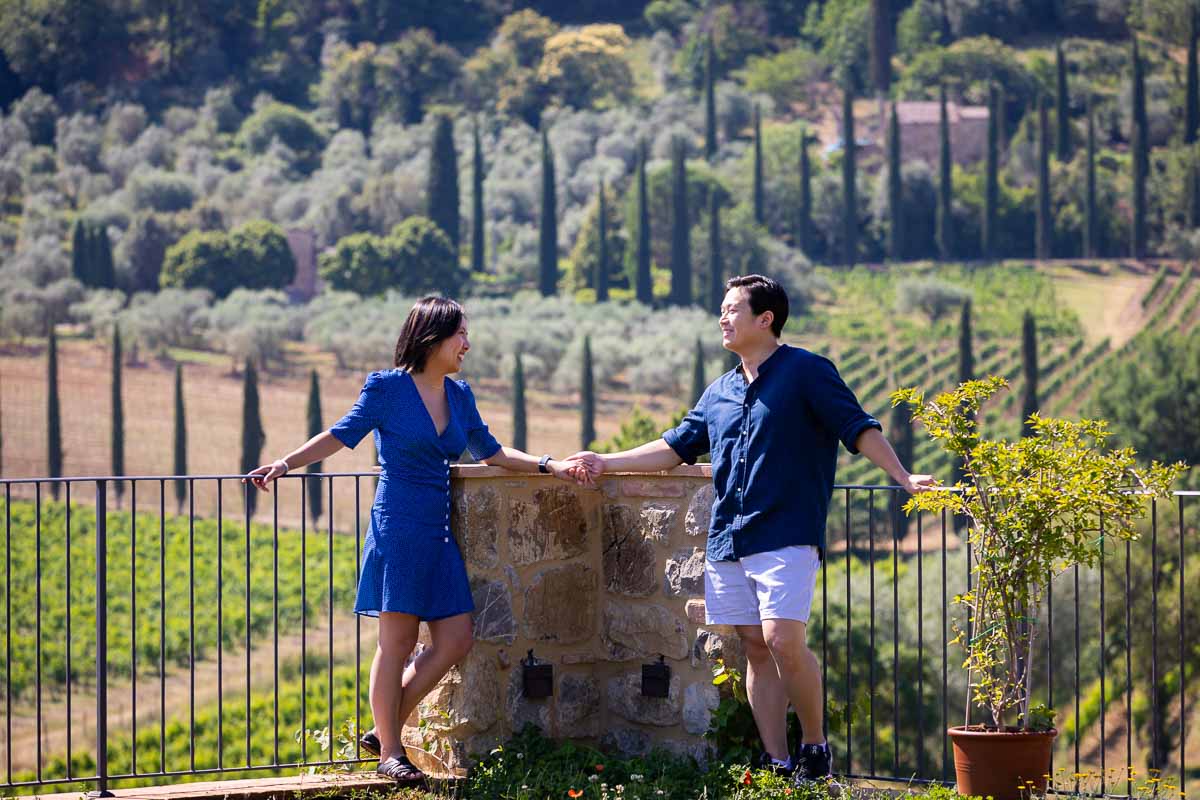 Couple portrait together in the Tuscan hills of Montalcino. Tuscany Proposal in Italy