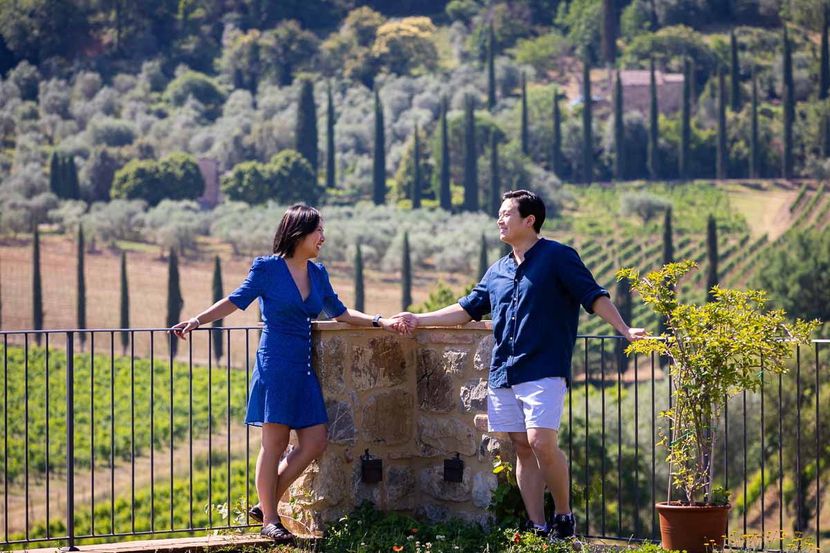 Couple portrait together in the Tuscany hills of Montalcino. Tuscany Winery Proposal 