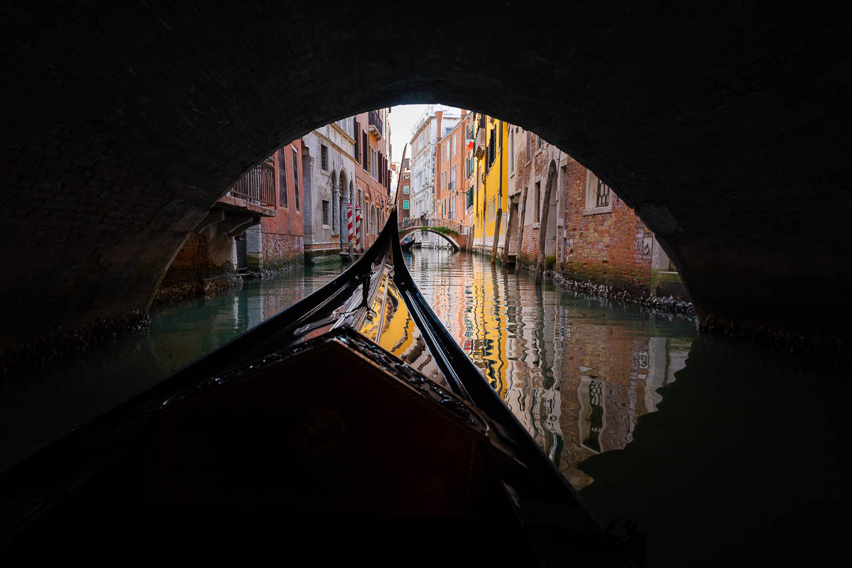 Riding under a bridge on a gondola