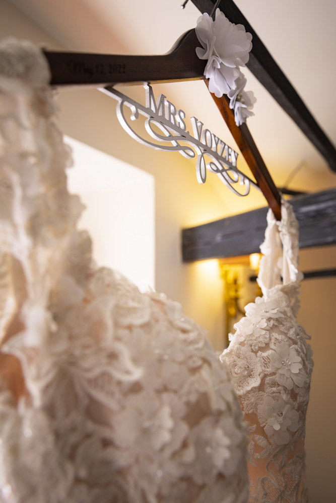 Wedding dress hanger with inscriptions closeup 