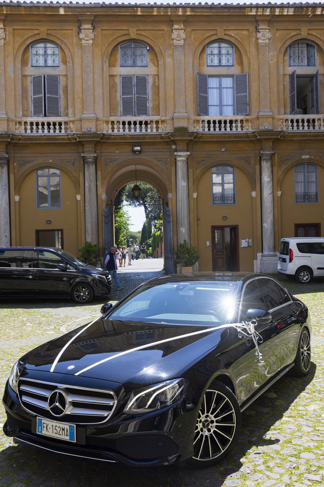 The wedding car pulling up into Sant'Alessio church in Rome's Aventino 