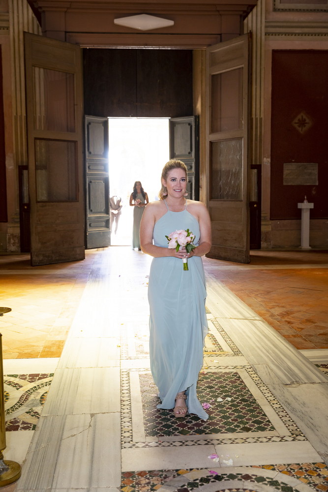 Bridesmaid one entering the church 