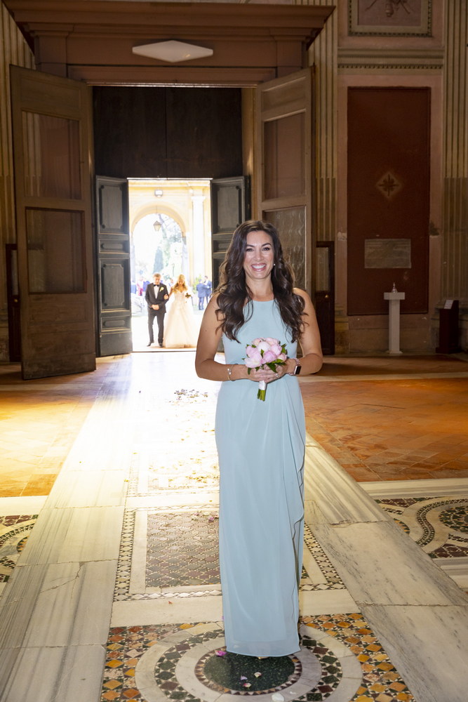 Bridesmaid two entering the church 