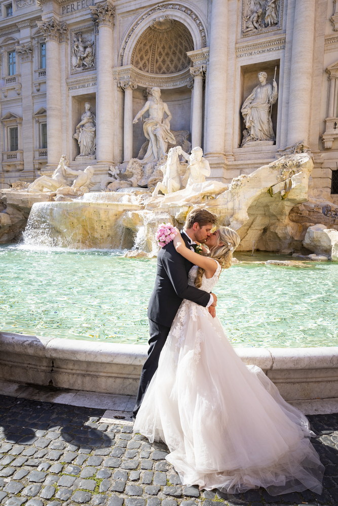 Newlywed portrait together at the Trevi fountain