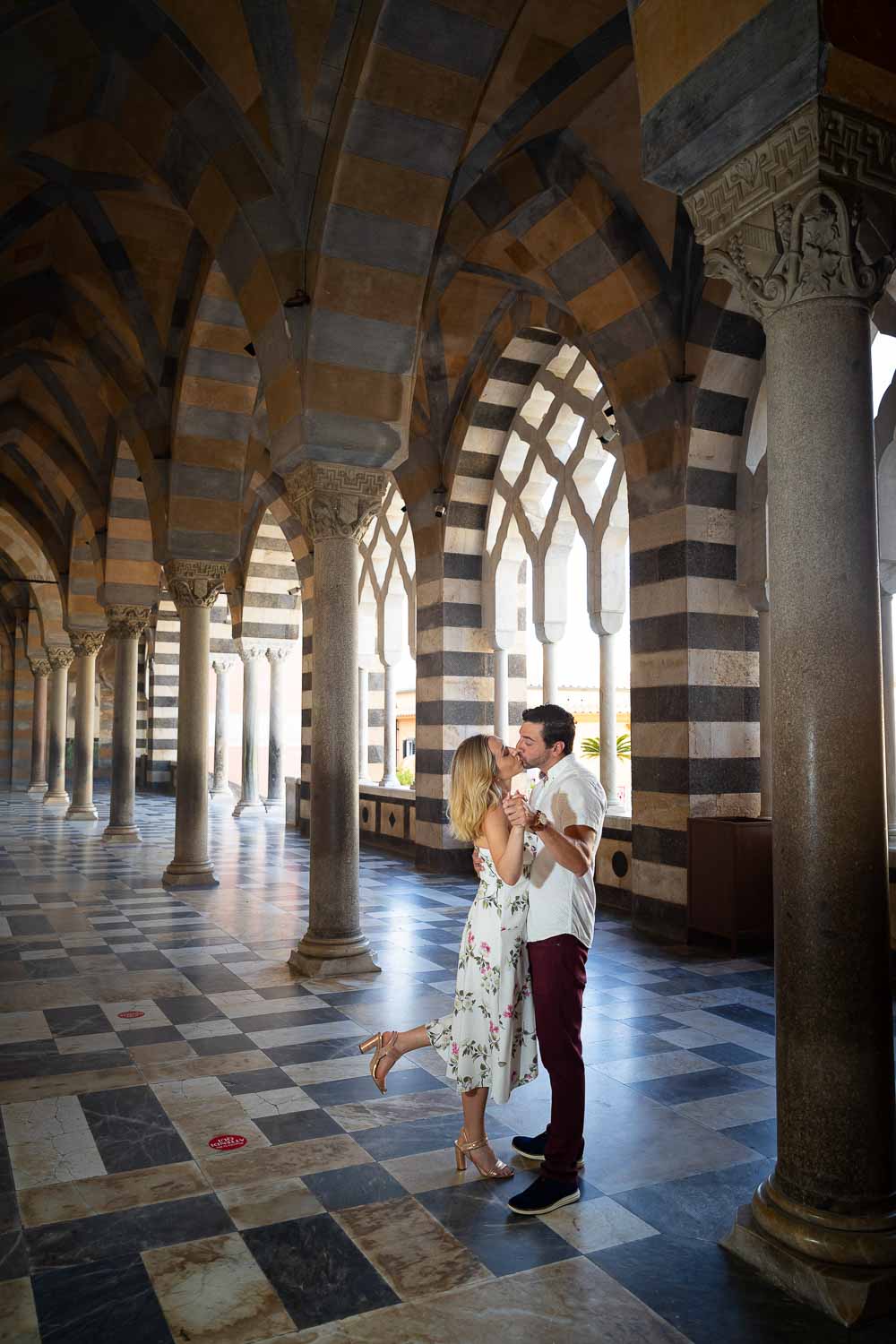 Standing and taking photos among the columns of the Amalfi Duomo