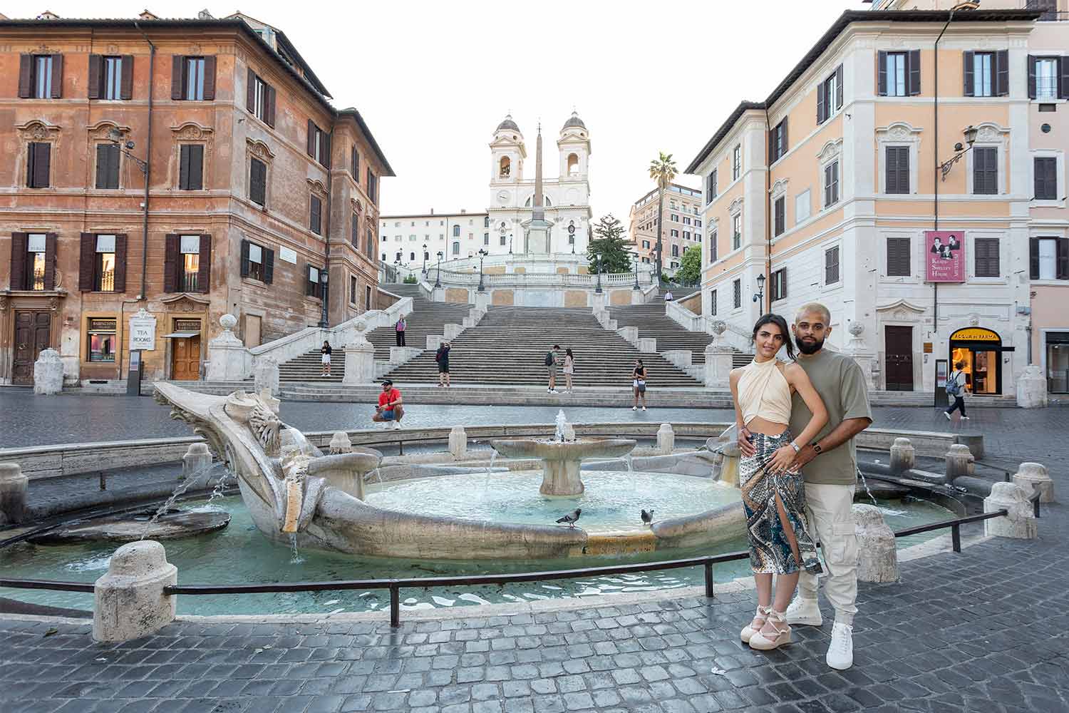 Engagement photography taken at the bottom of the spanish steps in the early morning