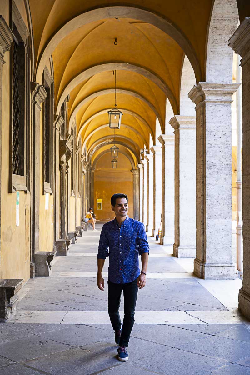 Walking underneath the colonnade of St Ivo alla Sapienza