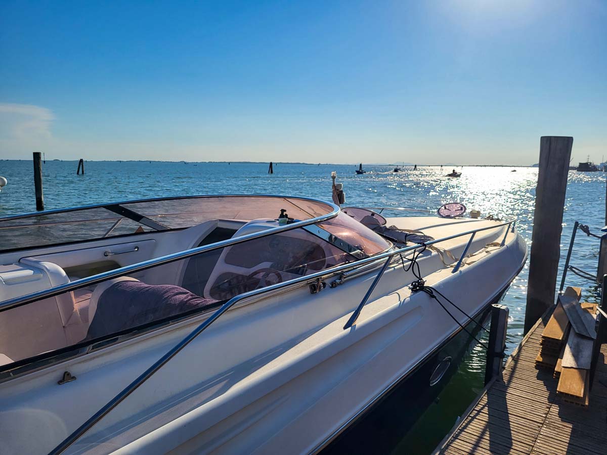 Yatch docked by the pier in Venice's marina