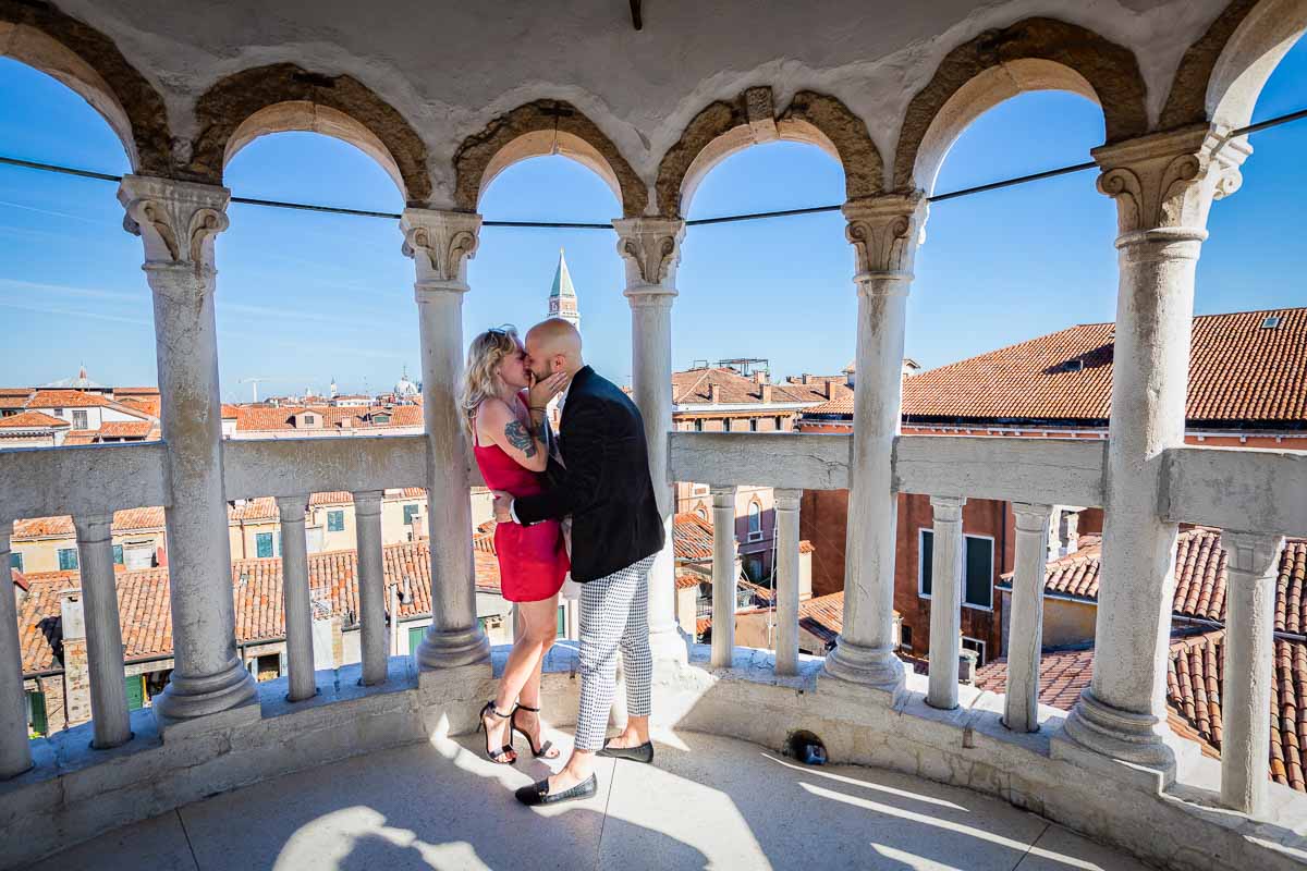 Just engaged in Venice Italy inside the top floor of Contarini del Bovolo tower with the splendid view in the background