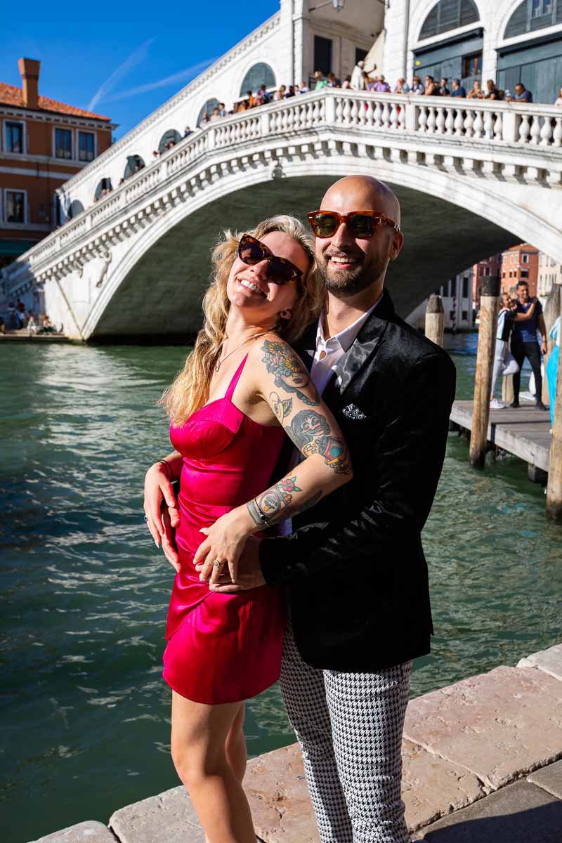 Close up couple portrait together in Venice's Ponte Rialto in Italy