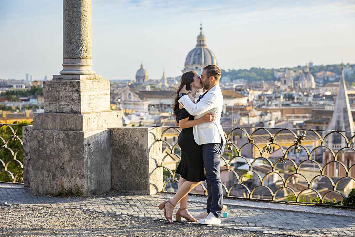 The she said yes moment standing on a terrace overlooking the roman skyline from a hillside view