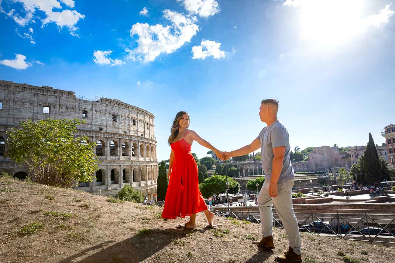 Engagement couple photo shoot in Rome Italy. Colosseum proposal 