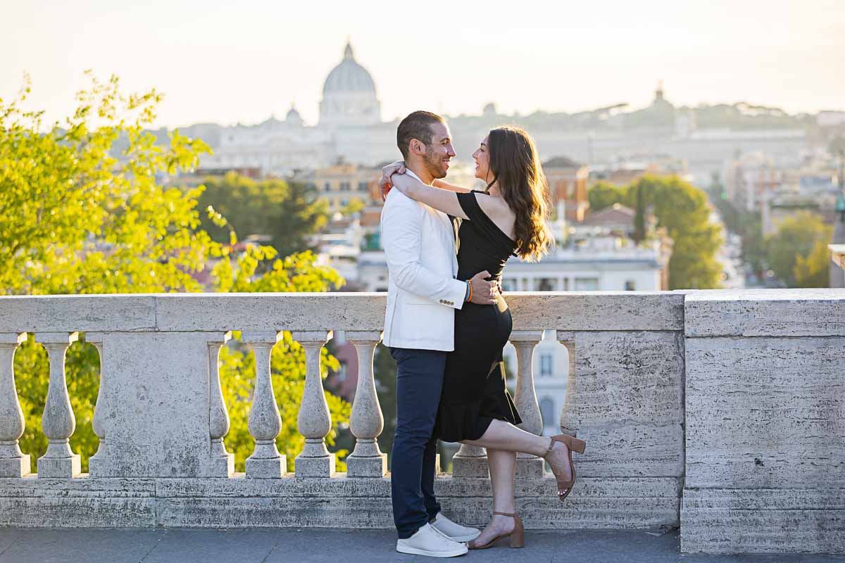 Couple posing for a photoshoot in Rome near the terrace outlook