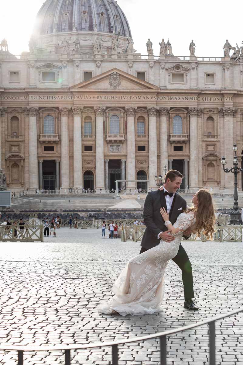 Doing a wedding dip in the Vatican square at sunset 