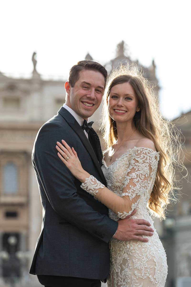 Golden light newlyweds portrait after the sposi novelli papal audience in the Vatican