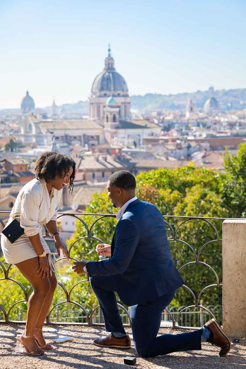 Proposing marriage overlooking Rome Italy