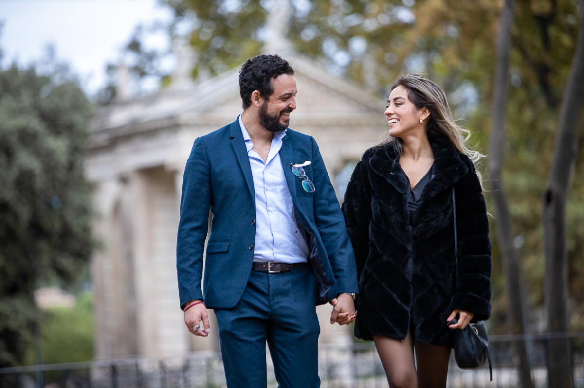 Walking together in the Villa Borghese lake in Rome Italy 