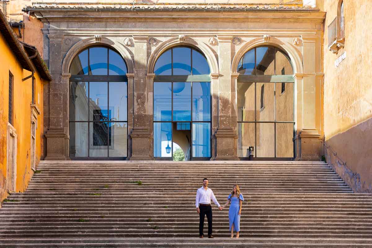 Standing on a large staircase found in Piazza del Campidoglio