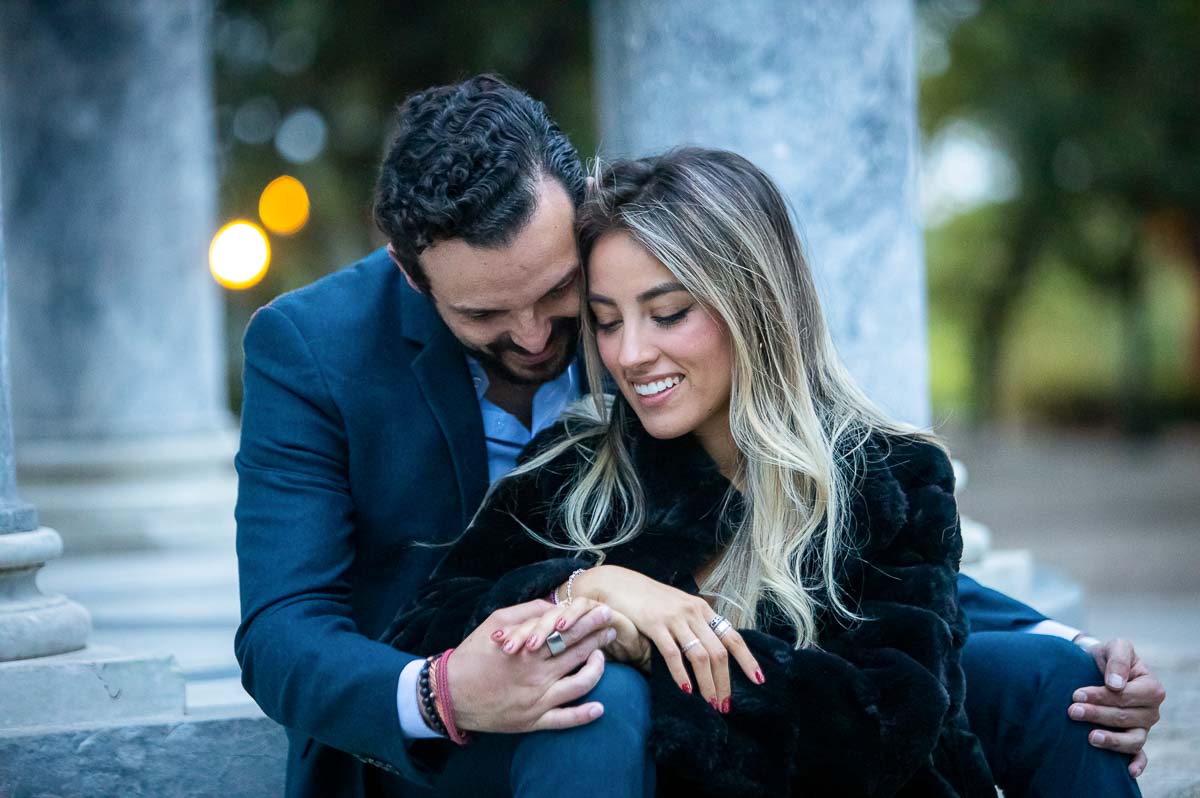 Admiring the engagement ring together during an evening couple photo shoot in Rome Italy