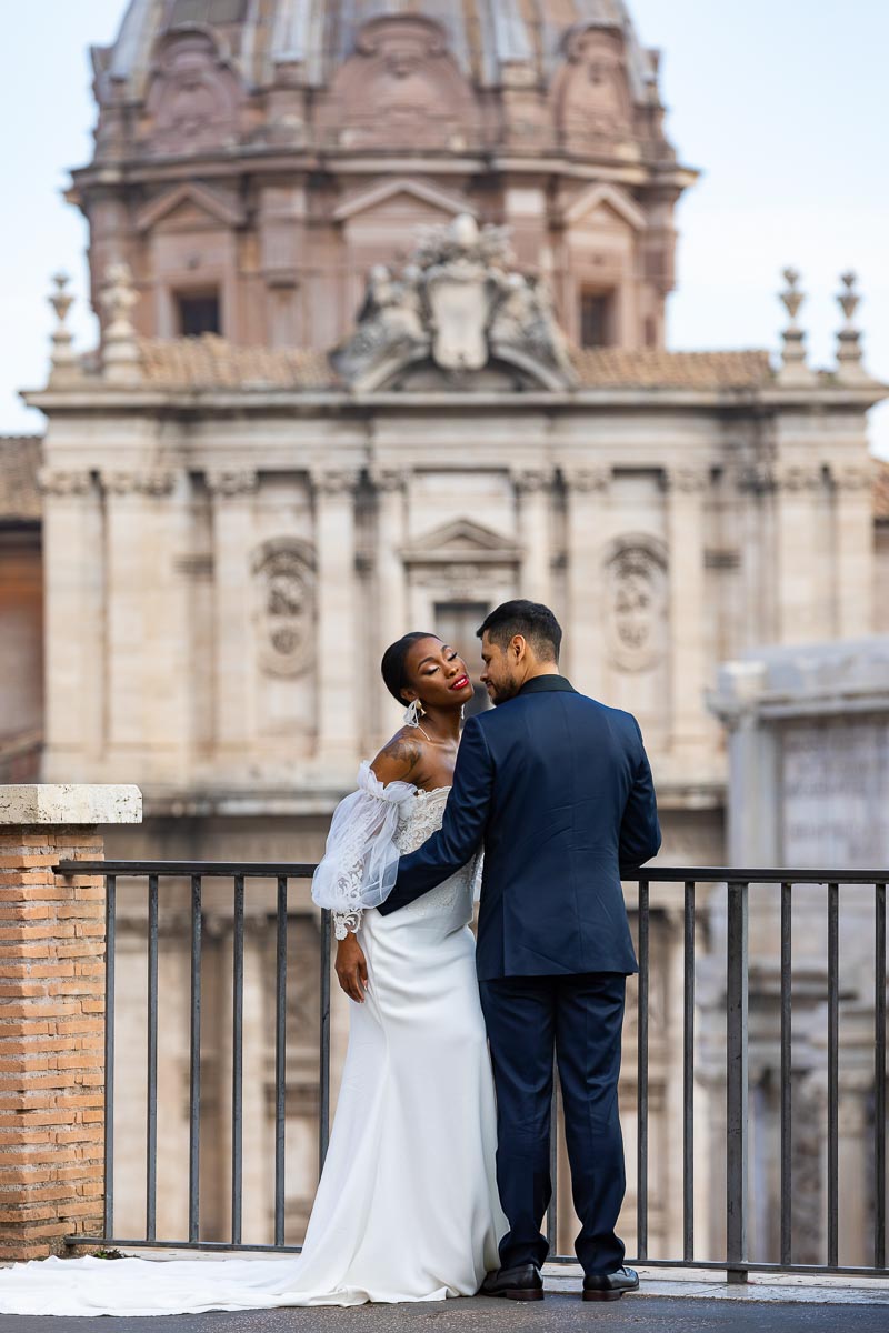 Couple portrait in wedding attire in Rome Italy. Image taken at the Roman Forum