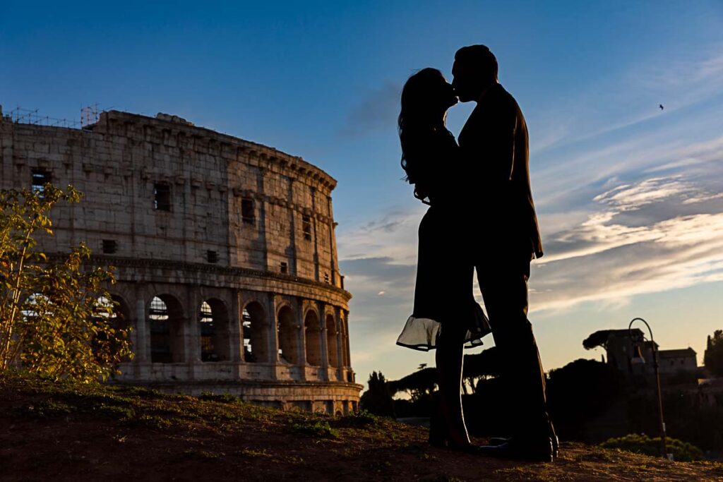 Silhouette couple photography. Roman Colosseum. Rome, Italy