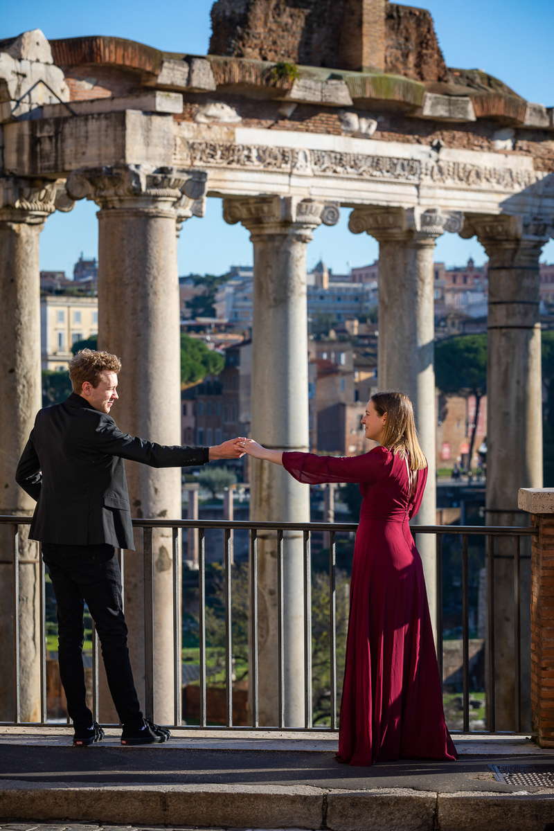 Taking couple pictures at the Roman Forum during a photoshoot in Rome Italy