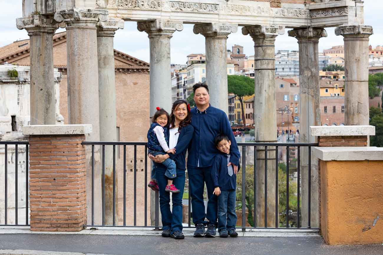 Family photo taken in front of the Roman Forum in Rome Italy. 