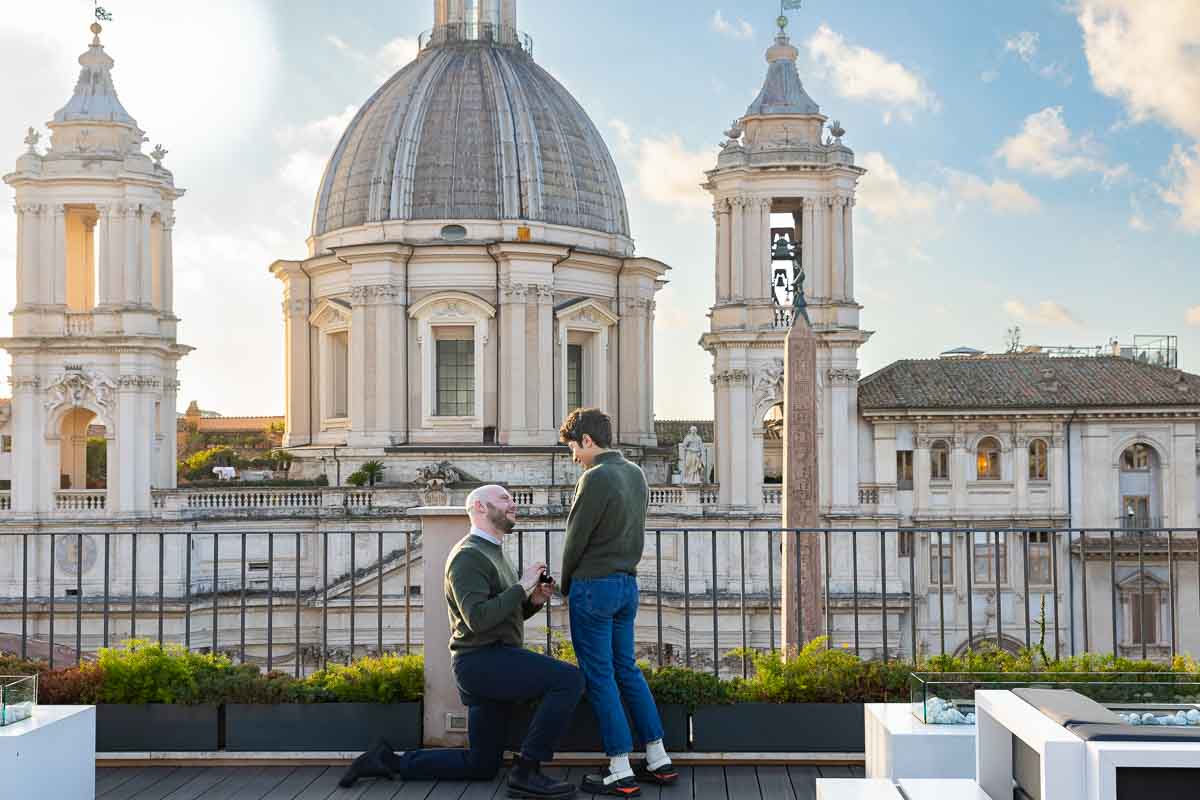 Surprise wedding proposal photography from one of Rome's most scenic terrace rooftop location