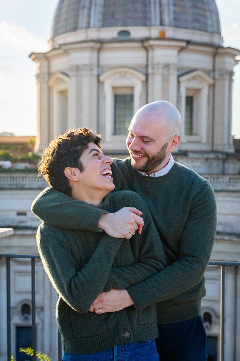 Couple Rome portrait with a 17th century church dome in the background