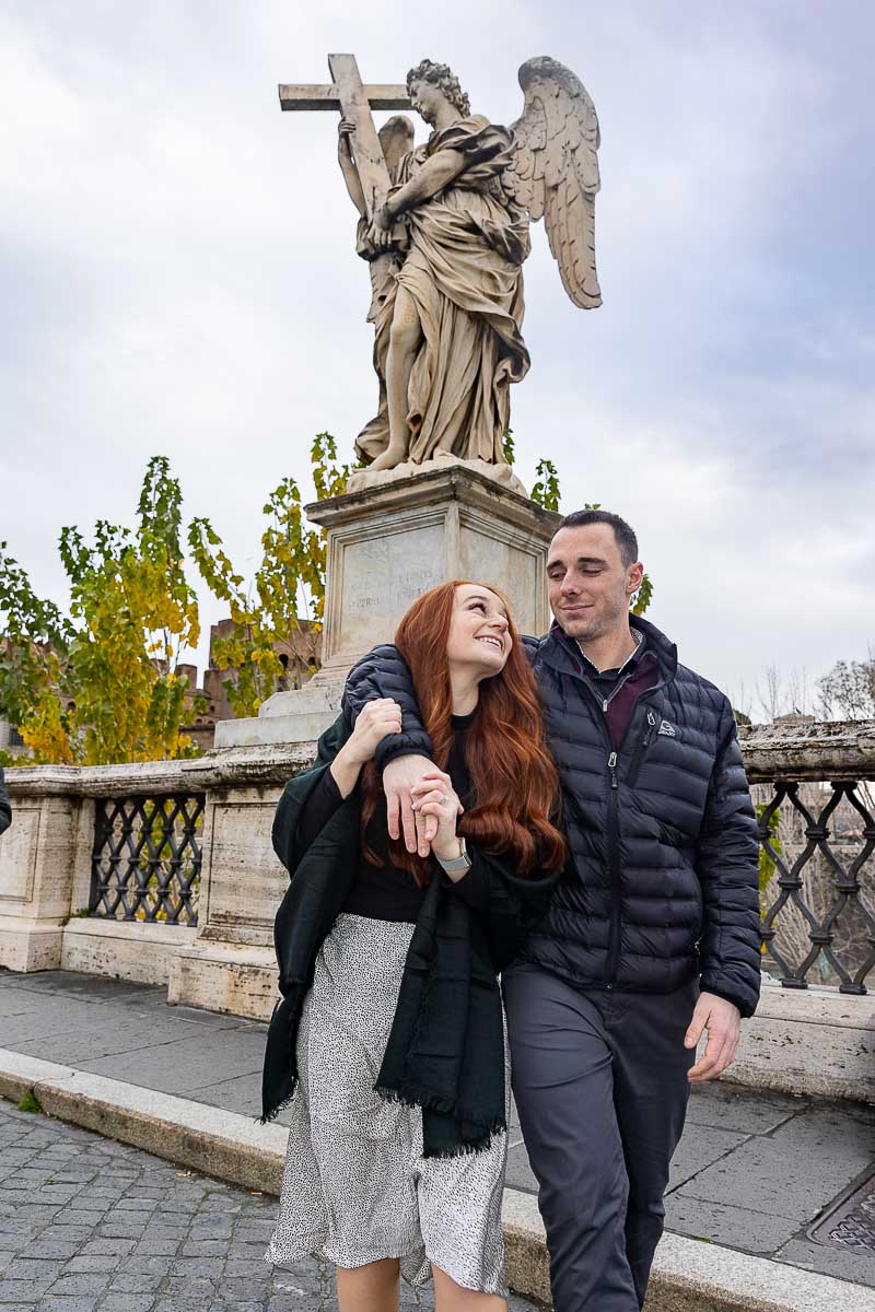 Walking together on the bridge after the proposal for the engagement pictures