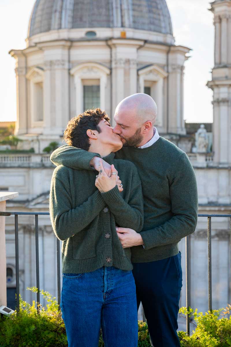Couple kissing in Rome Italy during an engagement photo session