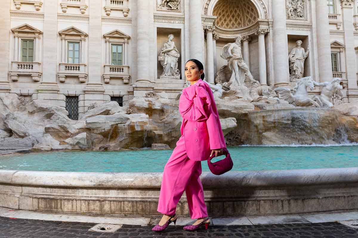 Model photography in Rome Italy. Outfit change one in bright pink. Fashion travel photography in Rome Italy