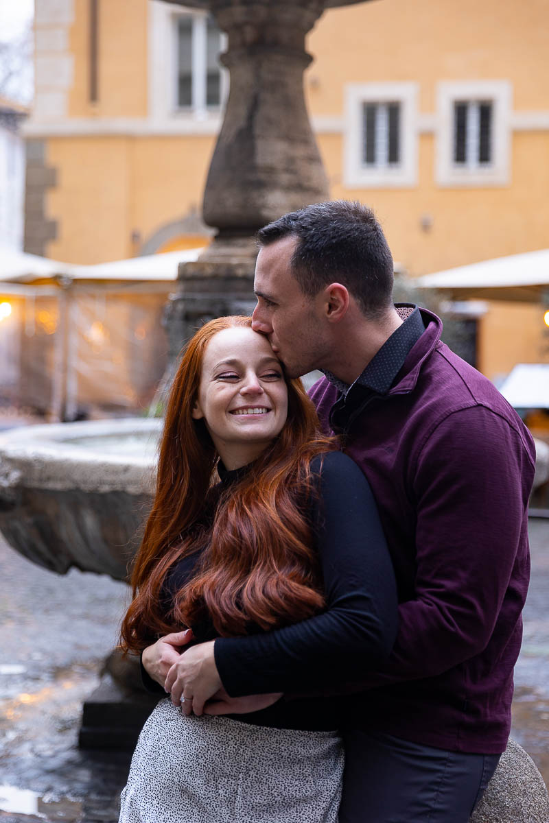 Couple kissing during an engagement photo session in Rome Italy