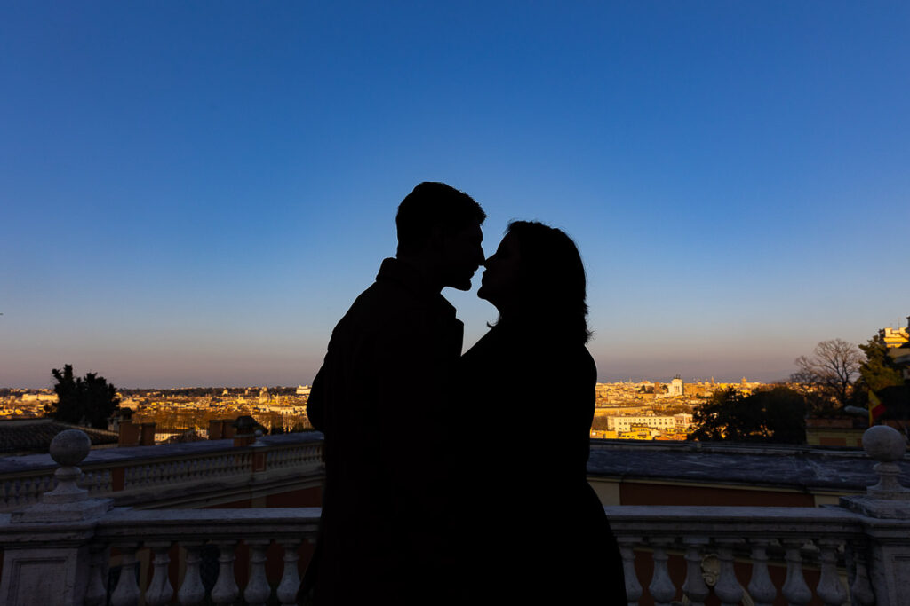 Silhouette image of a couple at sunset