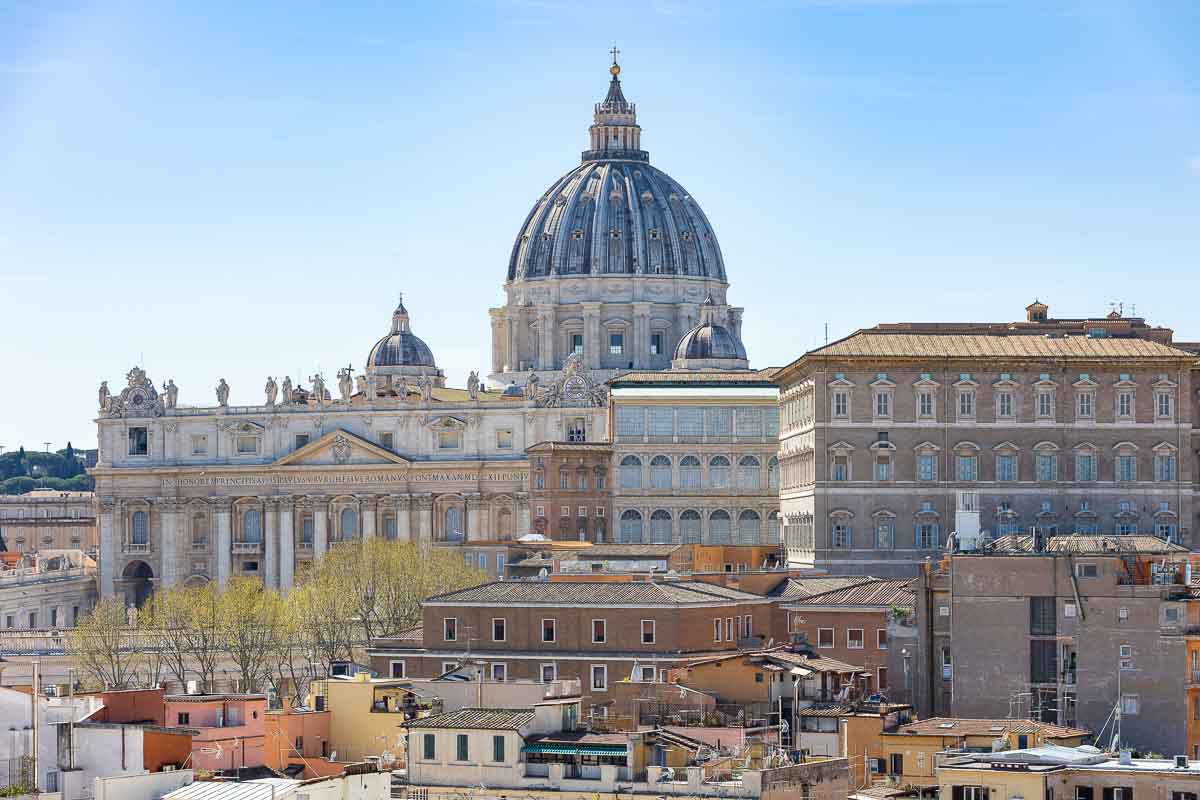 The dome of Saint Peter's cathedral viewed from a nearby terrace bar