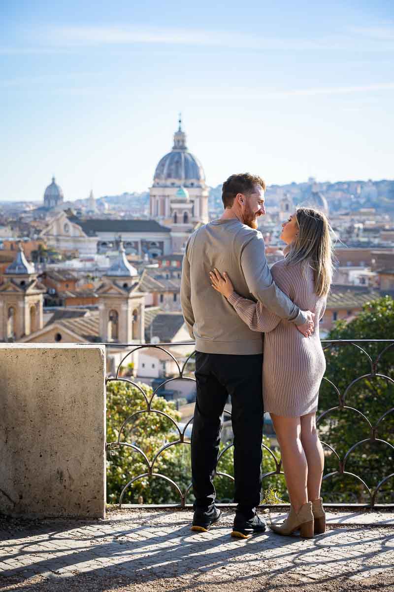 Portrait picture while looking at the roman skyline from the Pinci park terrace outlook 