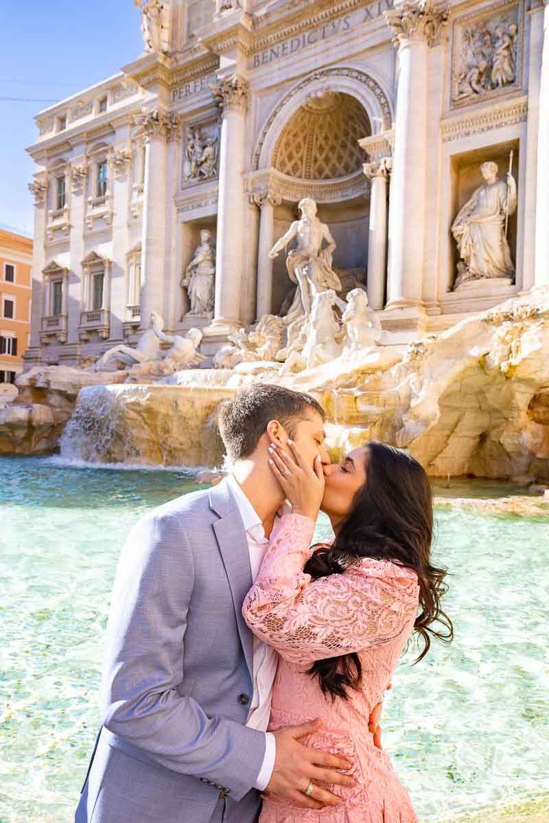 Trevi fountain couple portrait during an engagement photo shoot 