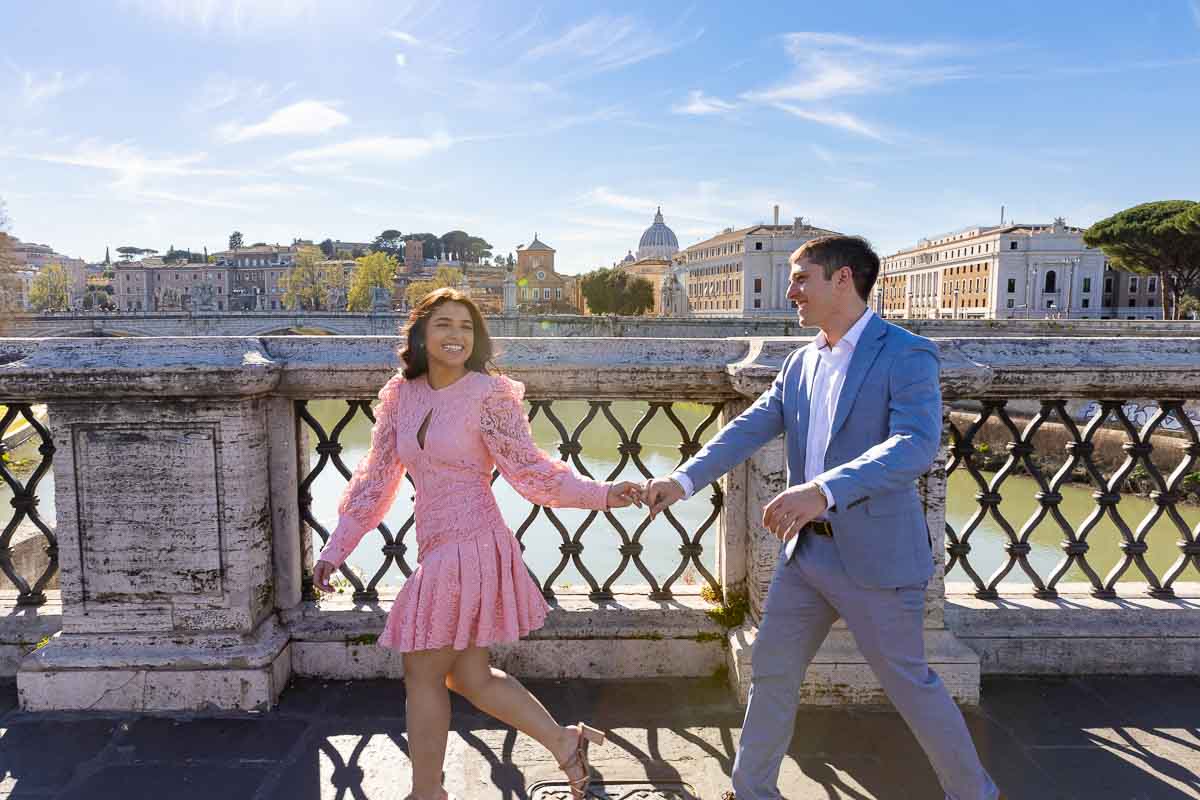 Walking in Rome hand in hand. Photo session on the Castel Sant'Angelo bridge